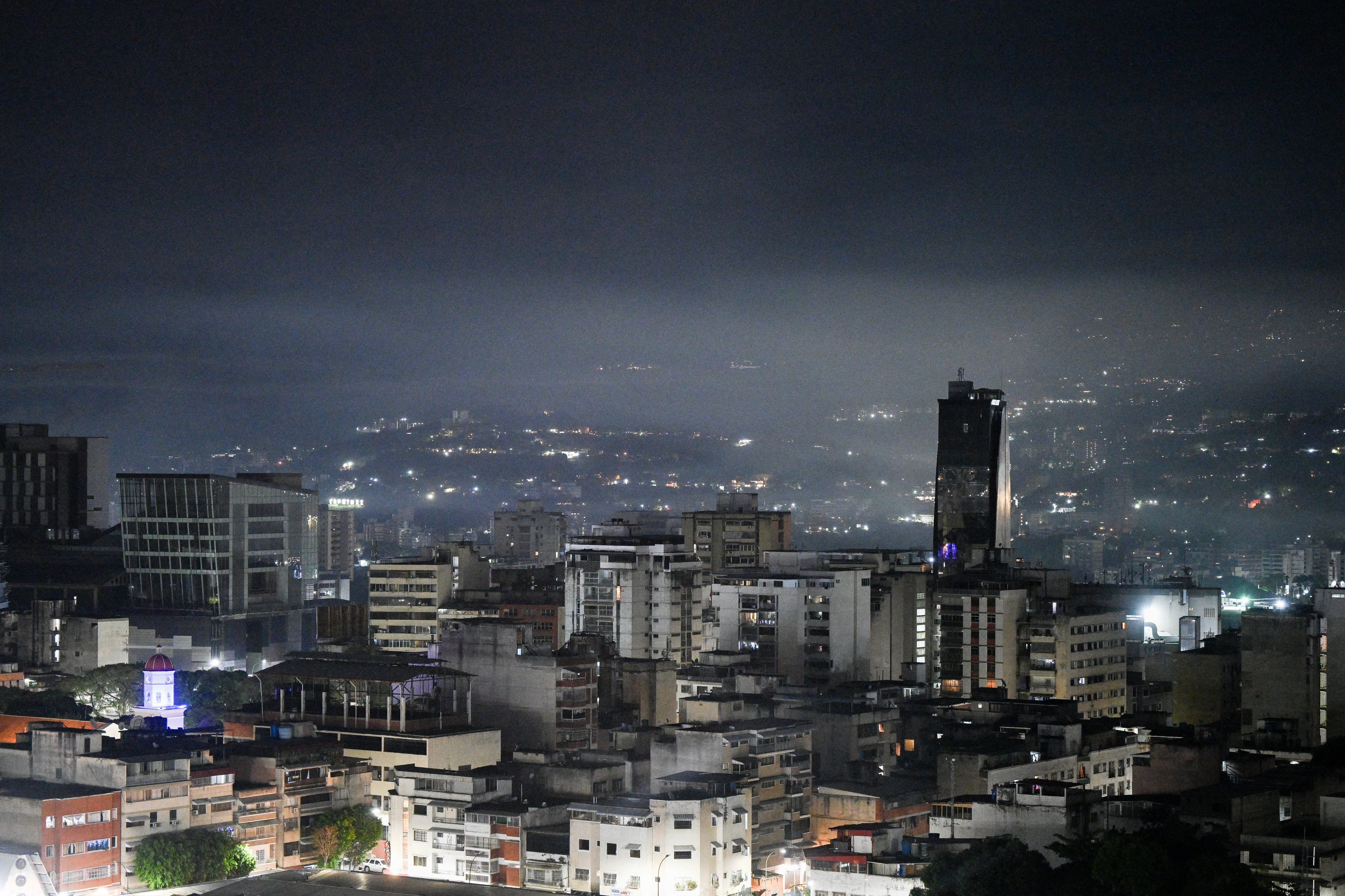 Night view of Caracas taken after a series of explosions heard on January 3, 2026